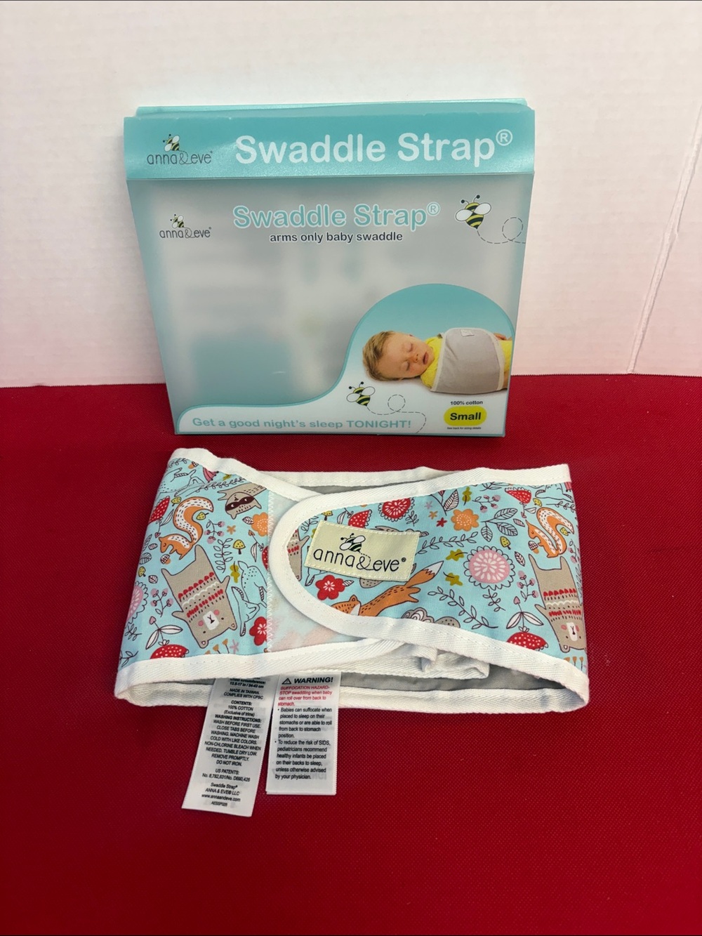 Anna & Eve Swaddle Strap in Light Blue Floral Print size small